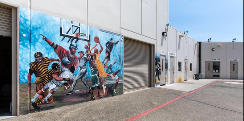 Mural of various athletes playing sports